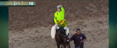 Joe Talamo salutes the crowd after a wire-to-wire score on Melatonin in the Big 'Cap.