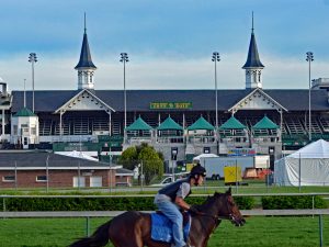 Horse galloping past the Twin Spires of Churchill Downs (photo by Tom Ferry).
